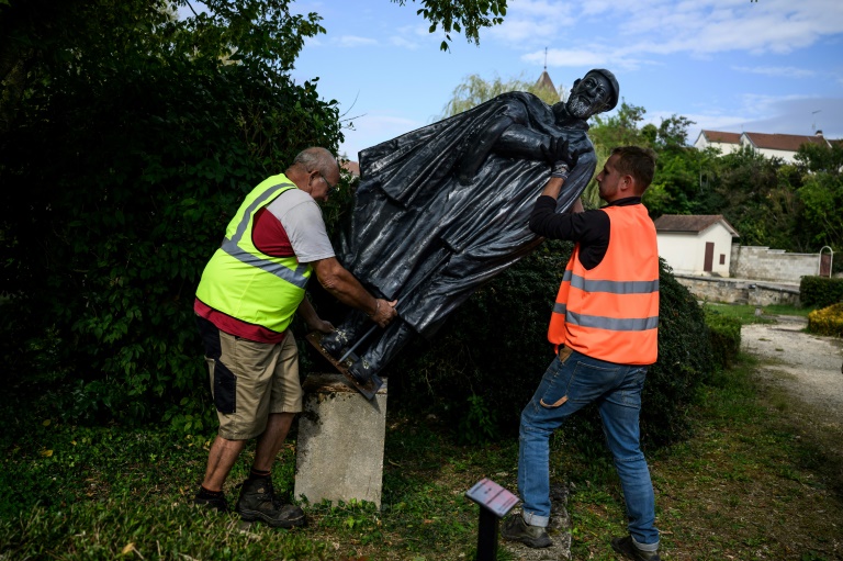 Statue of French charity icon Abbe Pierre removed after claims of abuse

